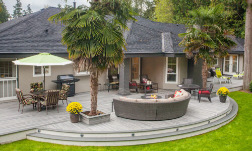 Curved edge DECK with curved furniture CURVED DECK, GROUND LEVEL PATIO DECK, TREX composite deck installation