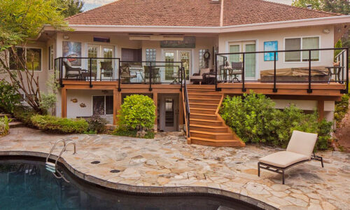 Raised deck with distinctive staircase Raised deck with distinctive staircase